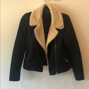 Black jacket with cream fur